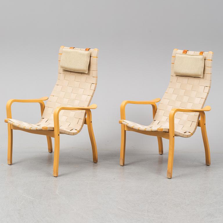 A pair of 'Primo' easy chairs by Yngve Ekström, for Swedese.