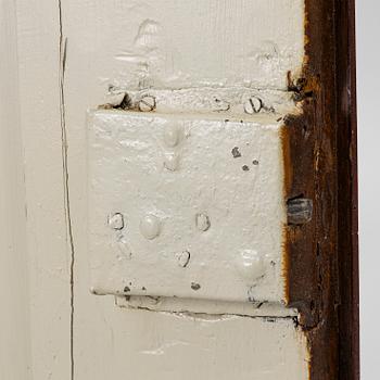 A corner cupboard, dated 1779.