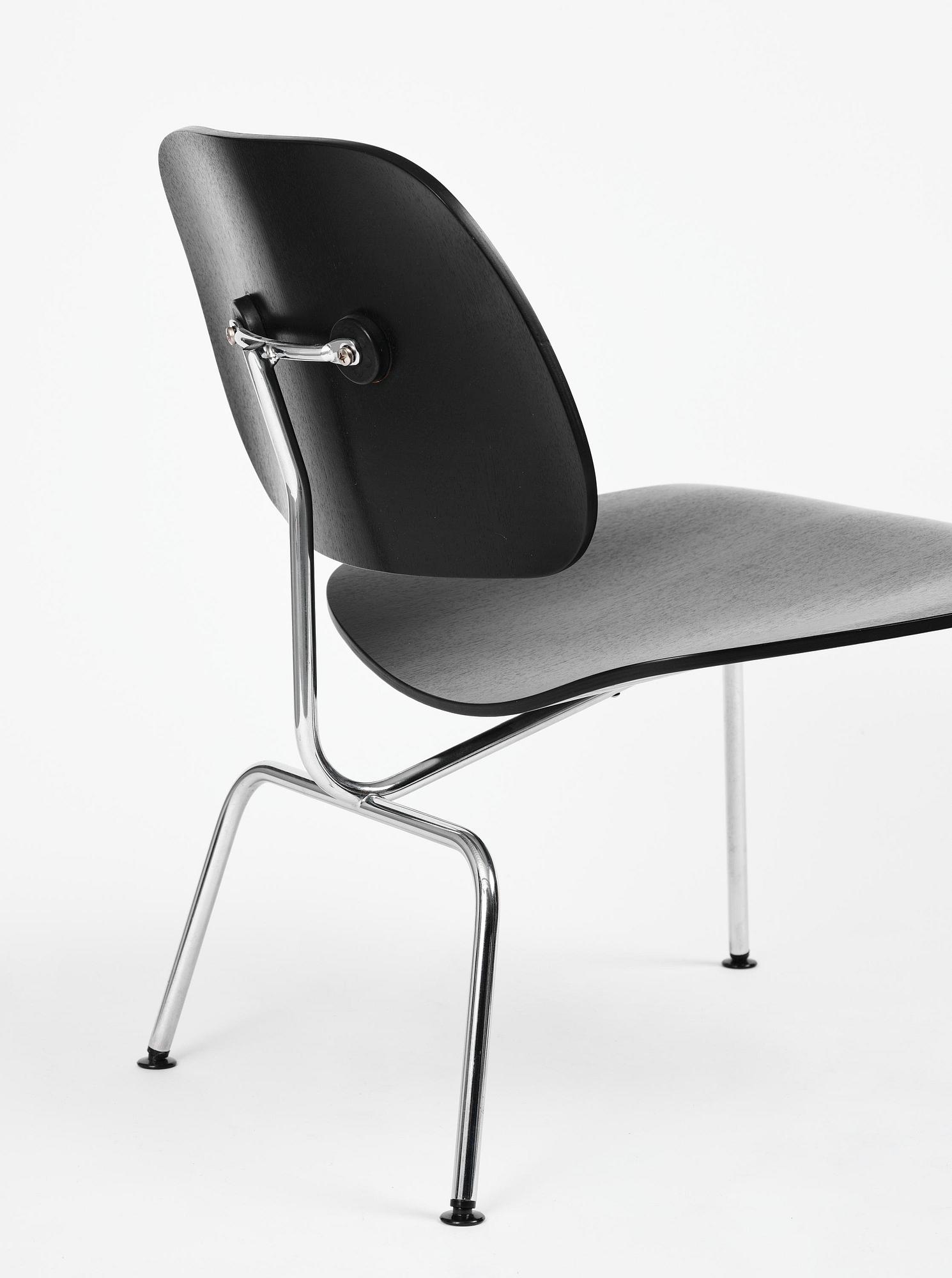 Charles & Ray Eames, a pair of "DCM" chairs, Vitra, 1997.