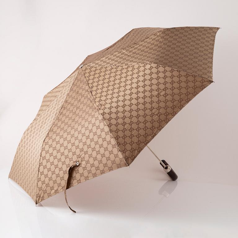 Gucci, an umbrella.