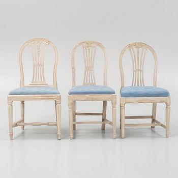 An assembled suite of eleven Gustavian and Gustavian-style chairs, late 18th century — late 20th century.