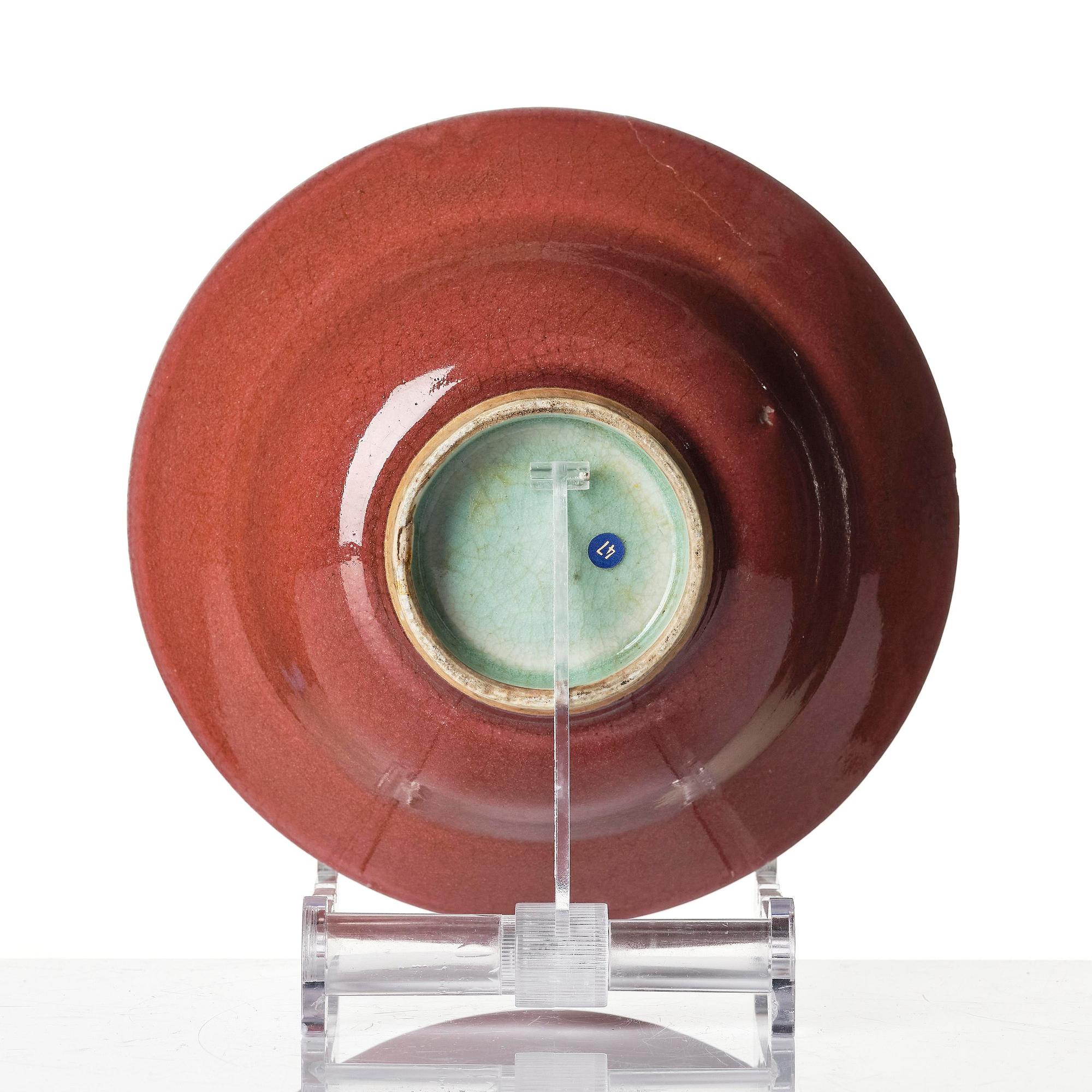 A red glazed bowl, Qing dynasty, 18th century.