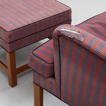 Kaare Klint, a pair of model 6212 armchairs with ottomans, Rud Rasmussen, Denmark.