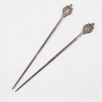 A pair of Victorian silver needles/skewers, England.