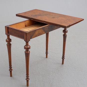 A late 19th century mahogany card table.