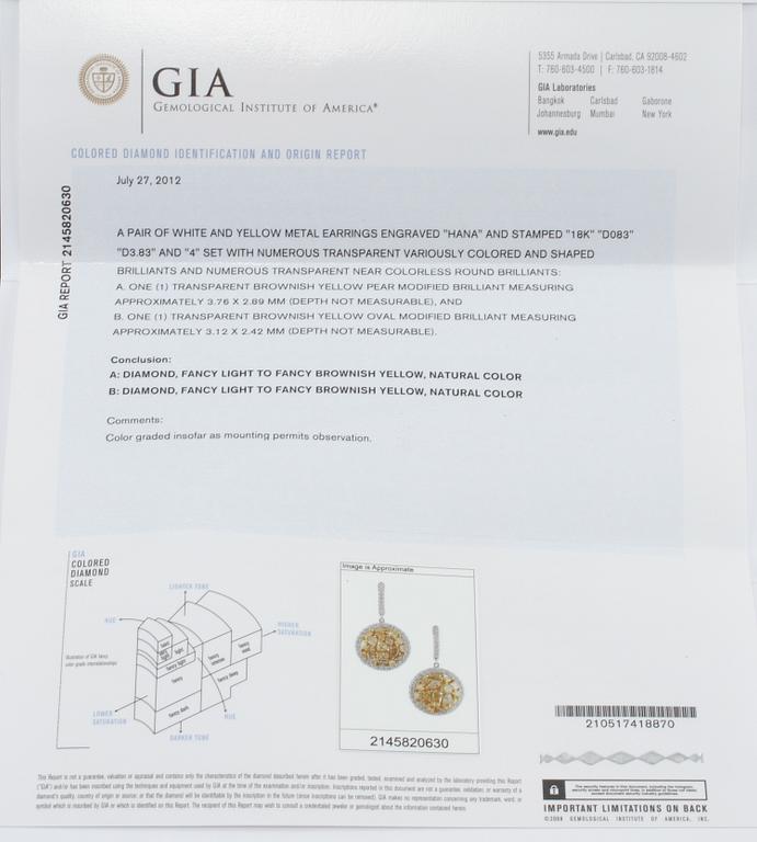 ÖRHÄNGEN, 18k guld och vitguld med briljant och baguettslipade diamanter, 4.66 ct. Vikt 11,8 g.