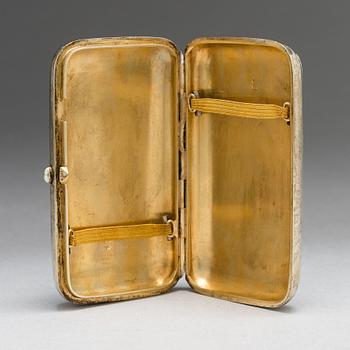 A cloisonné enamel and gilt silver cigarette case, maker's mark of Grigorii Andreev, Saint Petersburg, Russia 1885-1898.