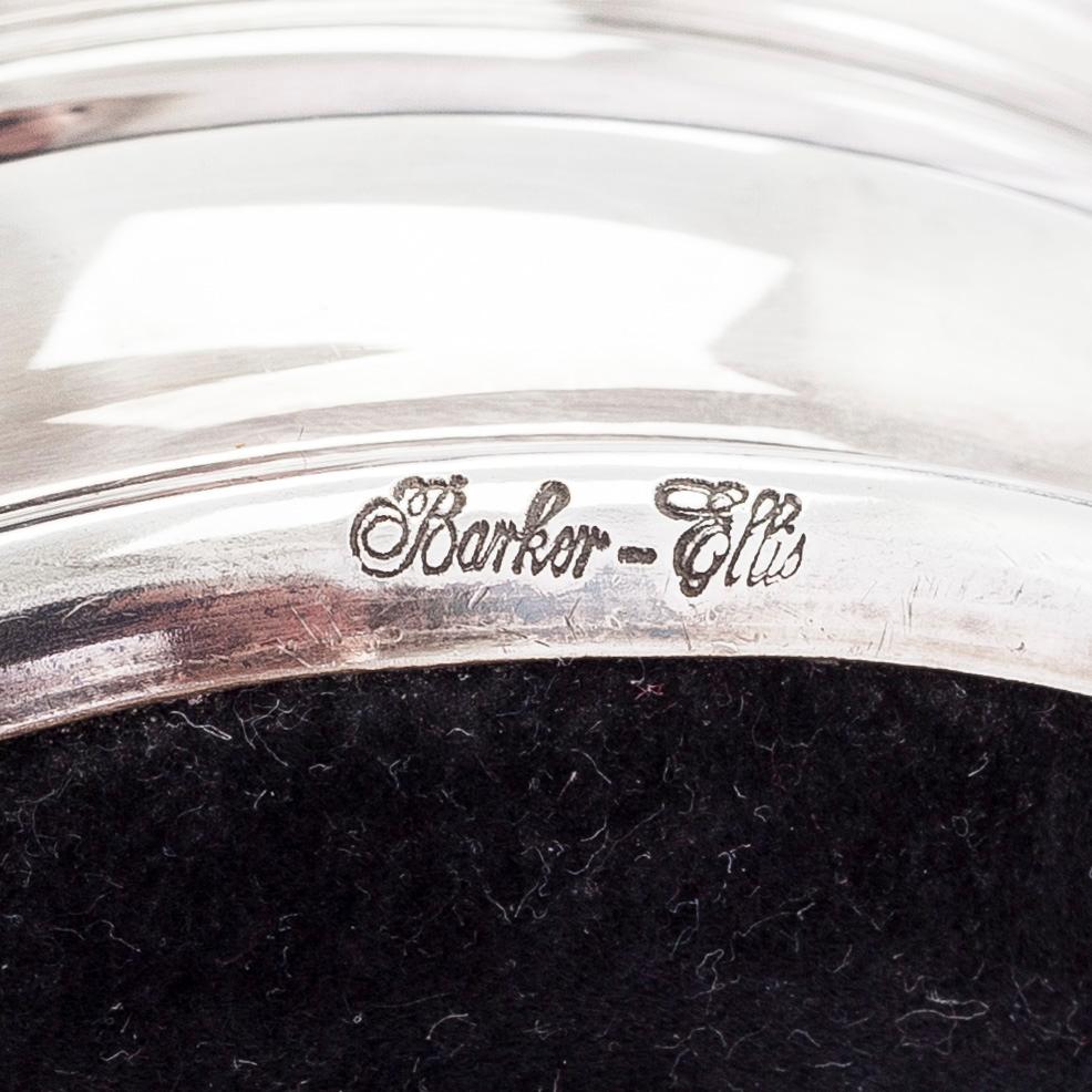 Coasters, 12 st, silver, Finland 1948-50 och coasters för vinflaska, 2 st, försilvrade, England.