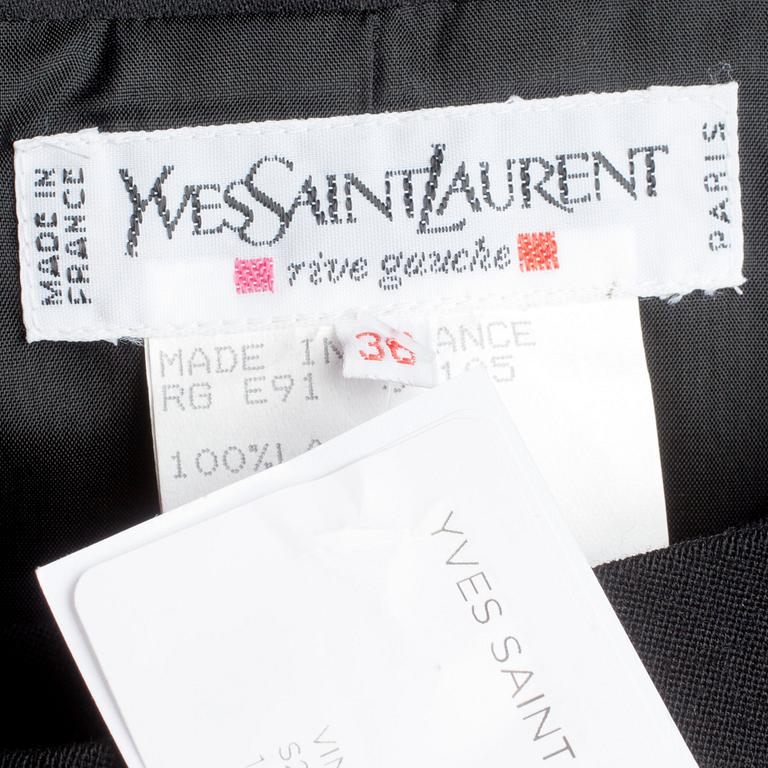 YVES SAINT LAURENT, a black wool dress.