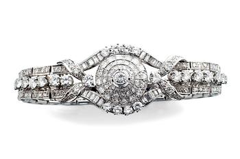 TIMANTTIRANNEKORU, platinaa sekä timantteja. Kok. paino n. 28,6 gr.