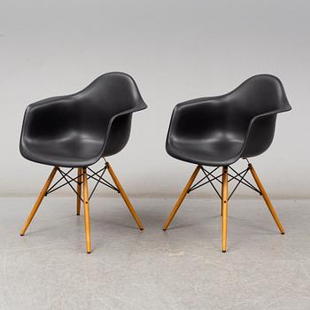 CHARLES & RAY EAMES, a pair of 'DAW' armchairs, Vitra, 2017.