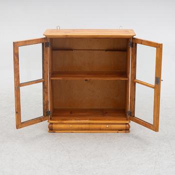 A small wall cabinet, around 1900.
