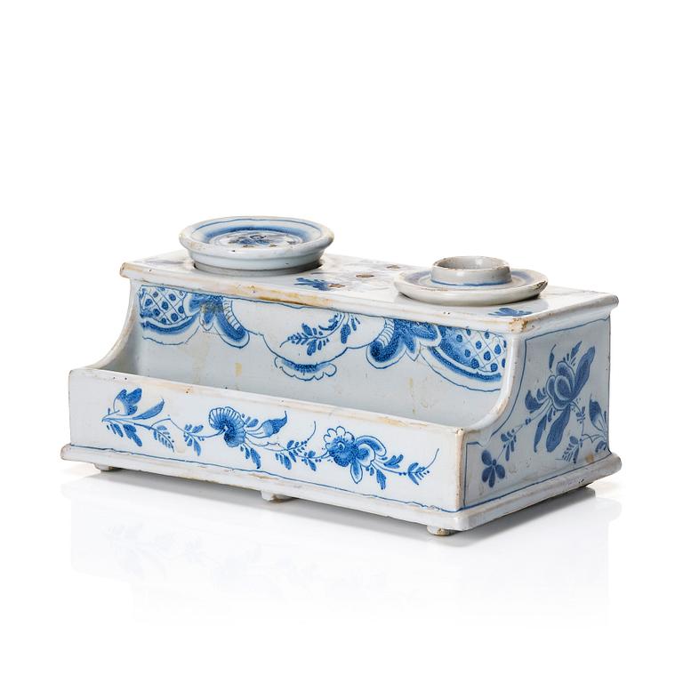 A Swedish Rörstrand faience desk set, dated Stockholm 24/10 1750.