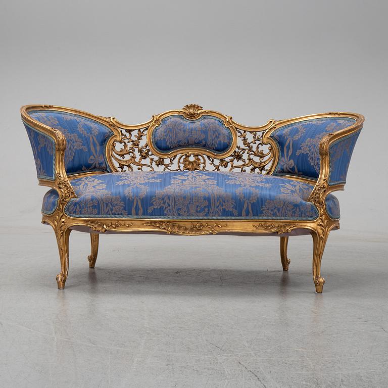 A Frennch 19th Century Louis XV style sofa.