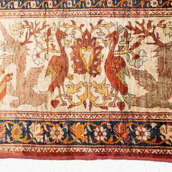 An antique silk Tabriz carpet, north west Persia, c 239 × 168 cm.