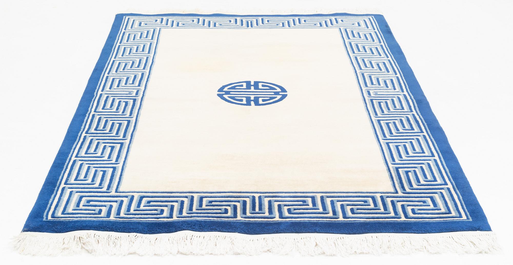 A carpet, China, circa 239 x 152 cm.