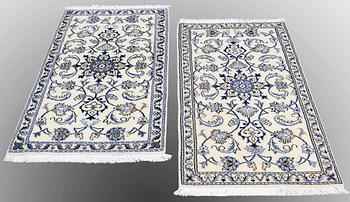 Two Nain rugs, ca 138 x 70 and 140 x 70 cm.