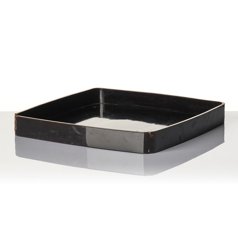 A Japanese lacquer tray and three Japanse wooden boxes.