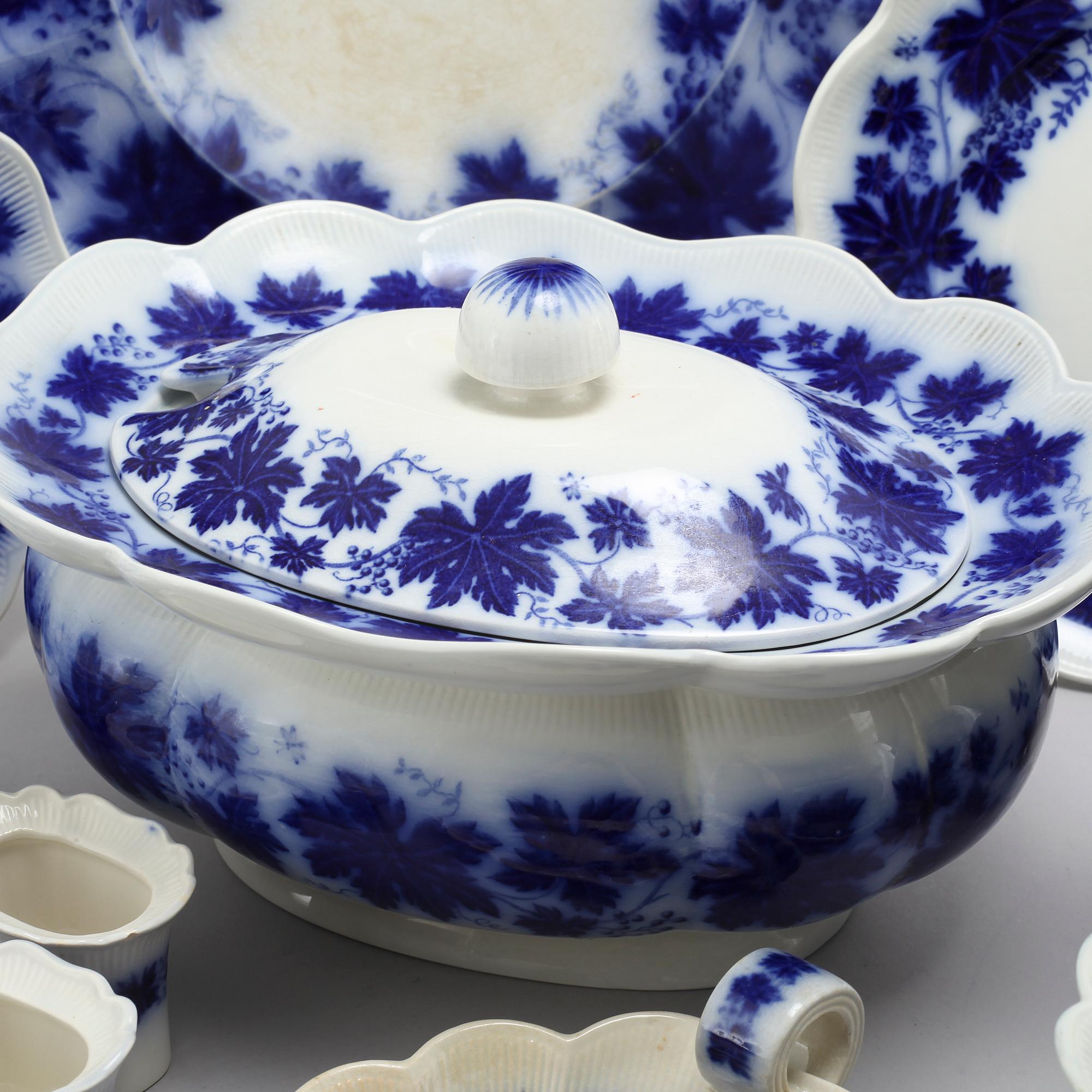 77 pieces of earthenware tableware by Arthur Percy for Gustavsberg, model "Vinranka", first half of the 20th century.