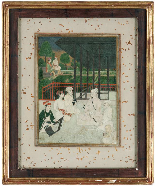 A Moghul  gouache of a seated party listening to music and reading poetry, presumably 18th Century.