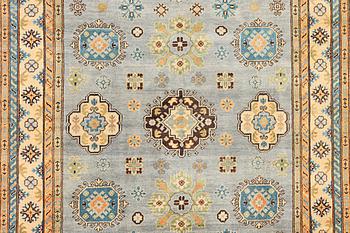A Kazak carpet, c. 295 x 206 cm.