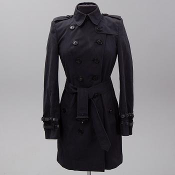 Burberry, a black cotton trenchcoat, UK size 8 (36).