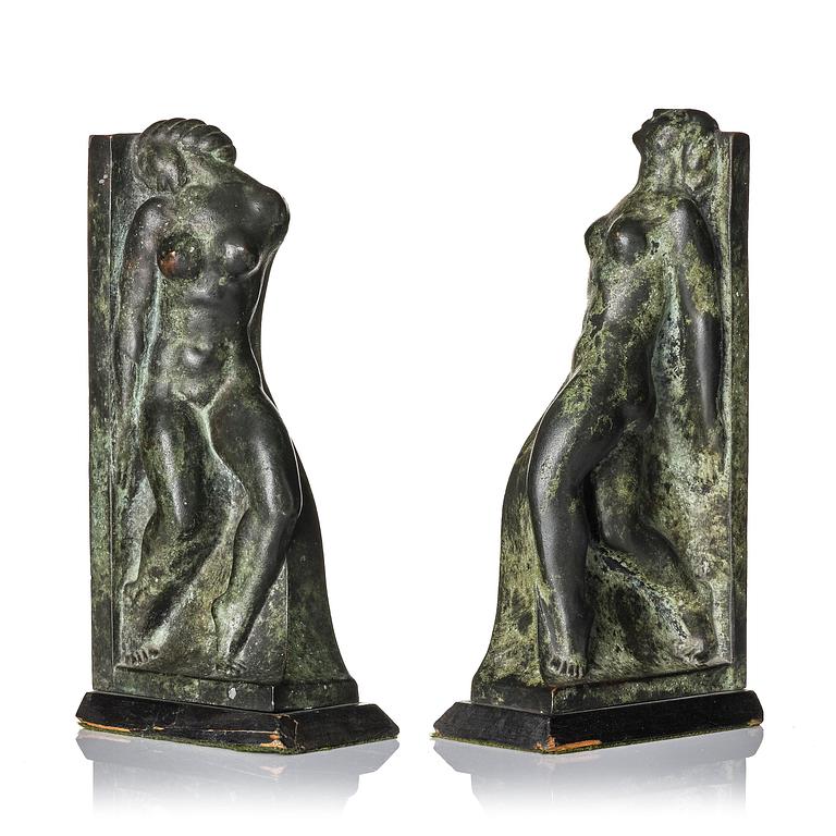 Axel Gute, a pair of Swedish Grace patinated bronze bookends, 1920s.
