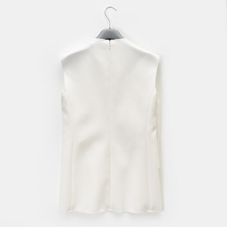 Céline, a bow top, size 36.