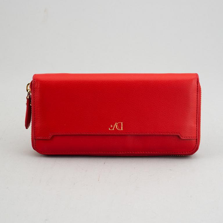 Diane von Fürstenberg a red leather handbag and wallet.