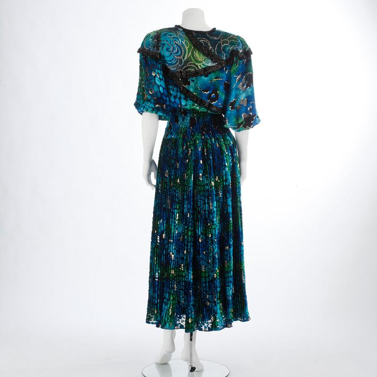 YVES SAINT LAURENT, a blue and green velvet dress.