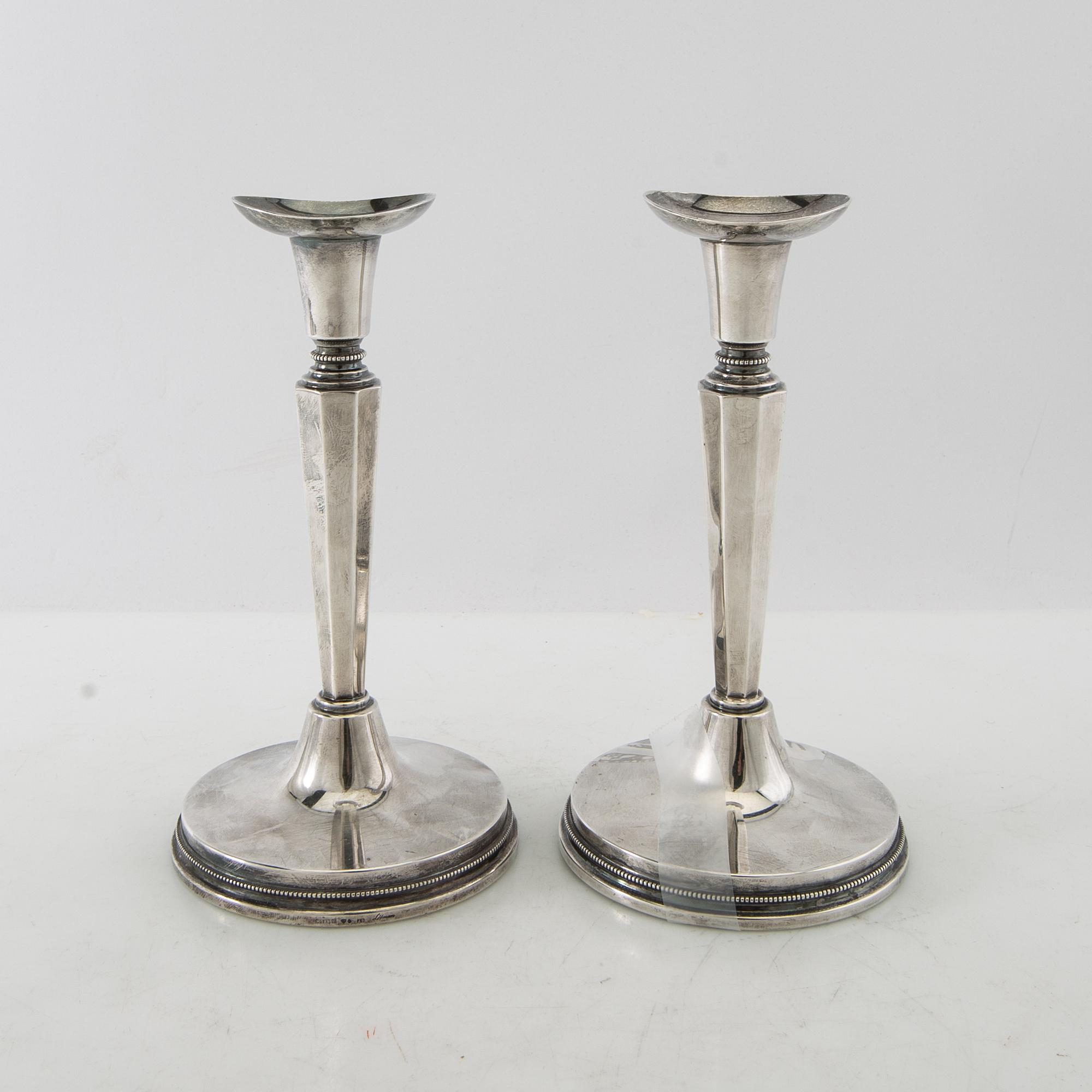 Eric Löfman, candlesticks, a pair, silver, MGAB, Uppsala, 1974.
