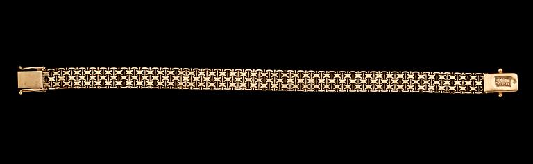 ARMBAND, 18 k guld, x-länk, svenska stämplar 1967. Vikt ca 18 gram.