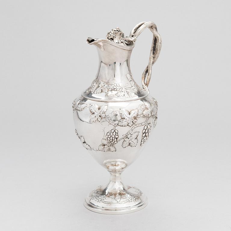 A George III sterling silver ewer by John Scofield, London, 1787.