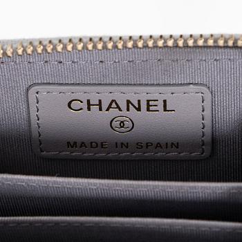 Chanel, A "19 O-coin purse" wallet.