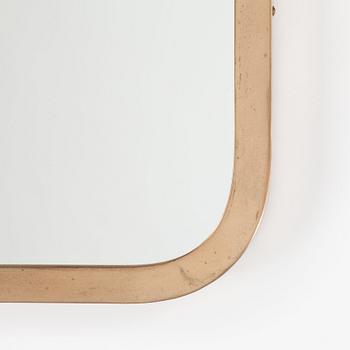 A brass mirror, possibly Josef Frank for Svenskt Tenn.