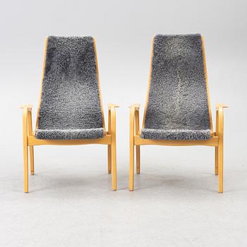 Yngve Ekström, a pair of 'Lamino' easy chairs, Swedese 2004.