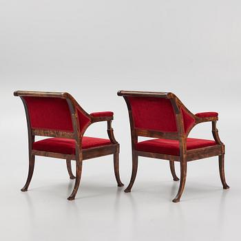 A pair of Empire style armchairs, first half of the 20th century.
