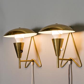 A pair of mid-20th-century wall lights / table lamps, model EV 57 for Itsu, Finland.