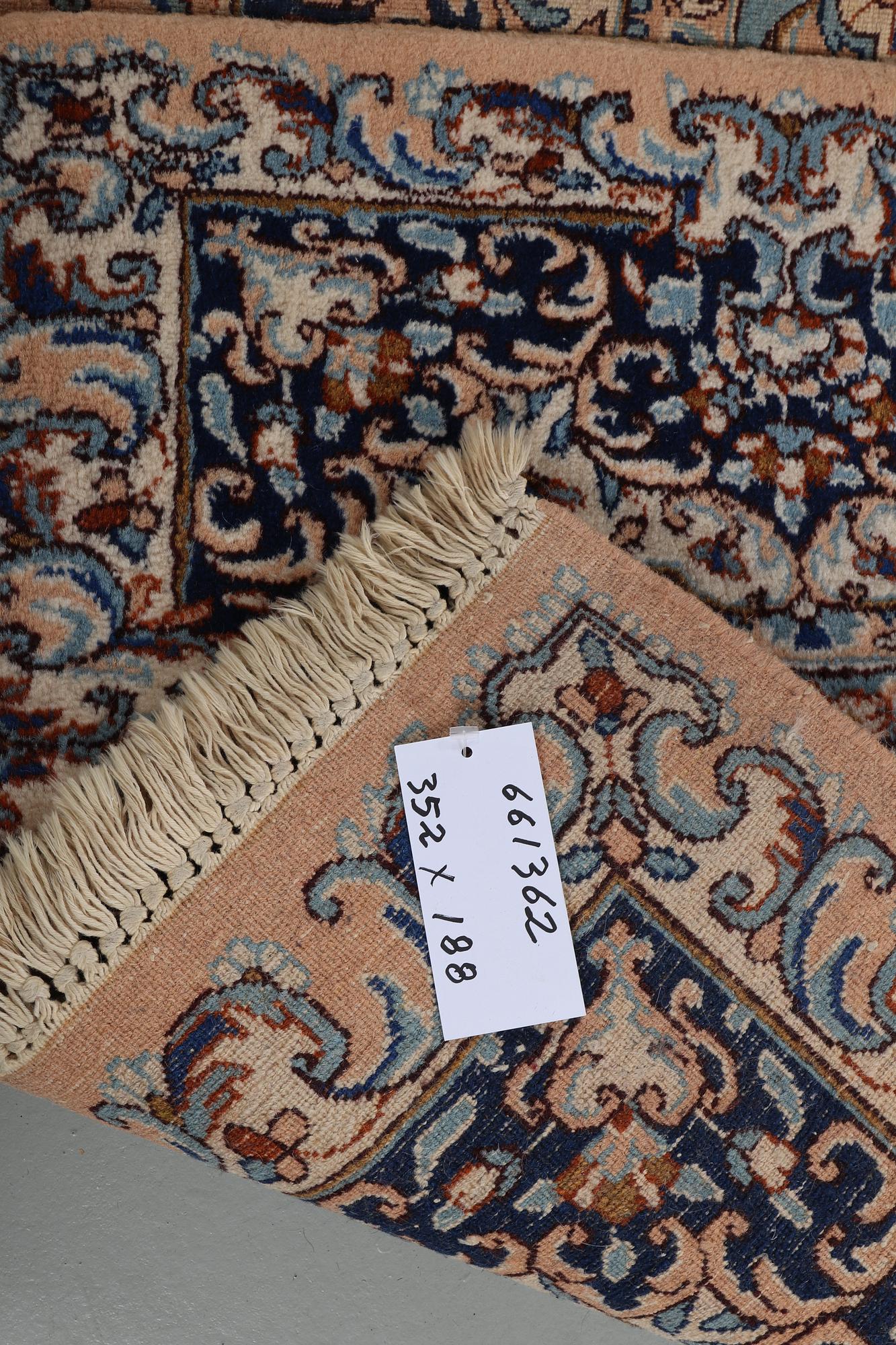 A carpet, Kerman, ca 352 x 188 cm.