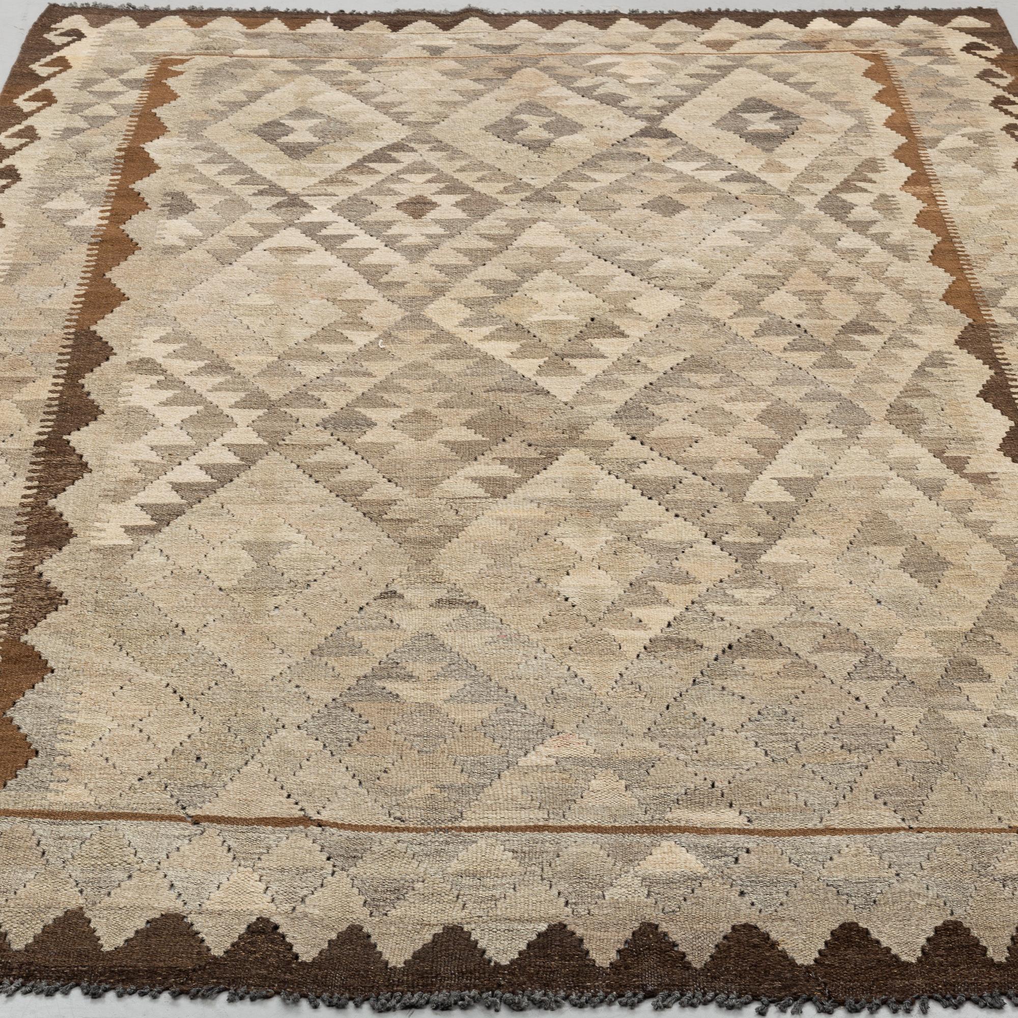A CARPET, Kilim 247 x 158 cm.