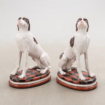 Decorative sculptures a pair England 20th century glazed ceramics.