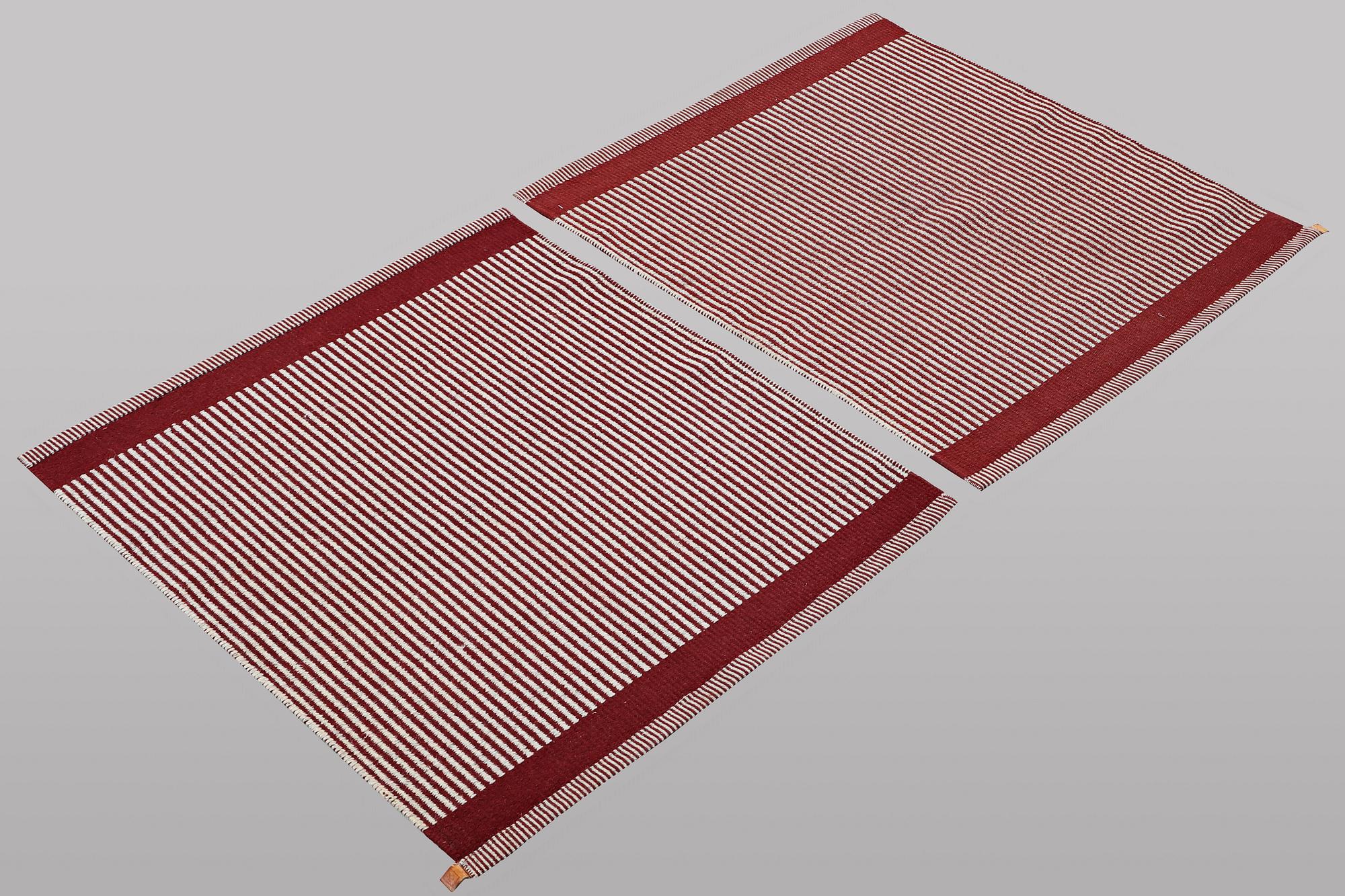 A pair of carpets, Kasthall, ca. 94 x 76 cm & ca. 94 x 86 cm.