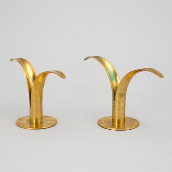 Two brass candlesticks by Ivar Ålenius-Björk, "Liljan", Ystad Metall.