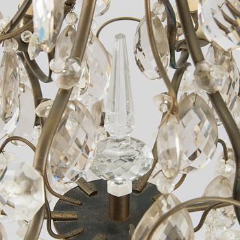 A rococo style chandelier, early 20th century.