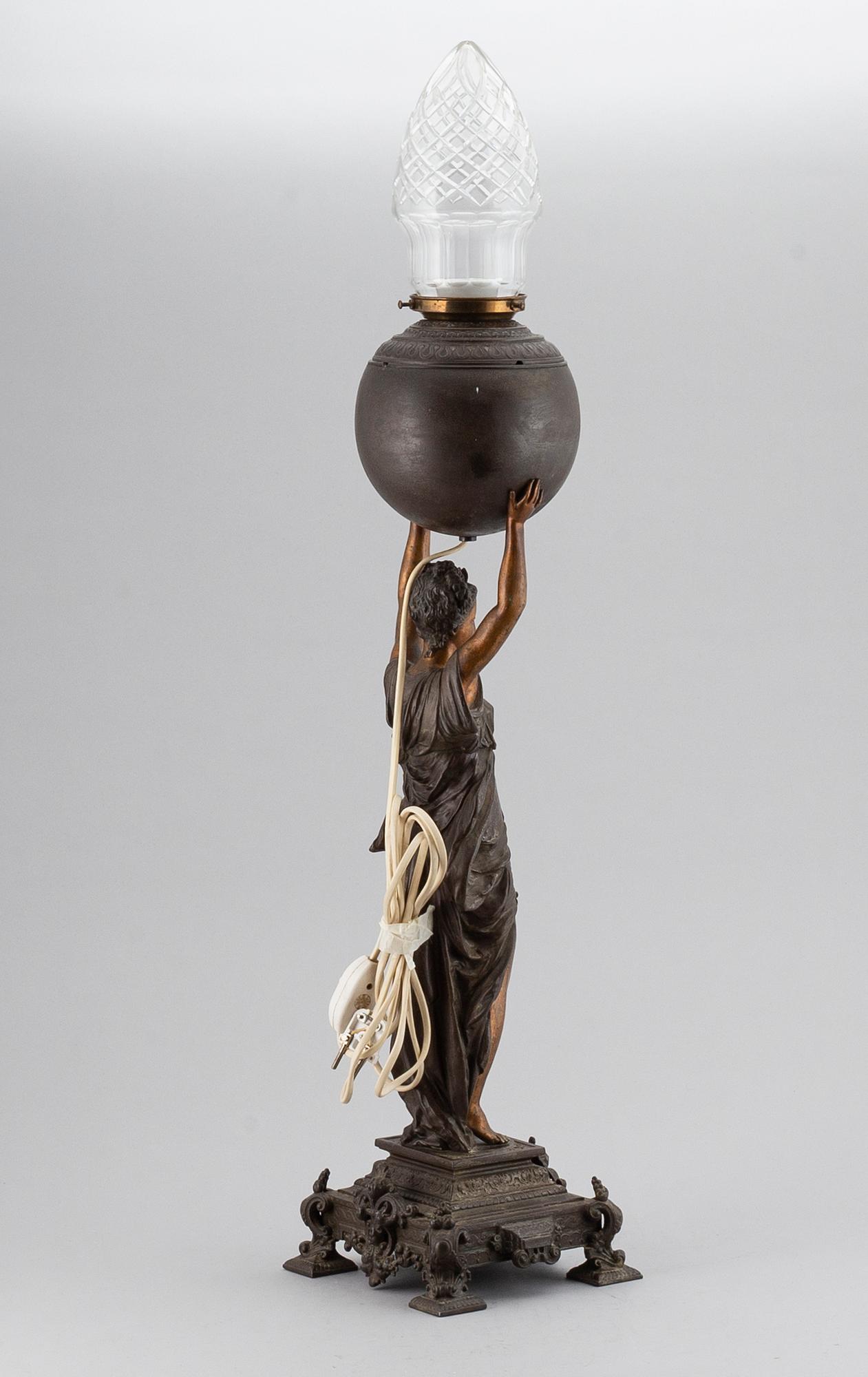A spelter table light, circa 1900.