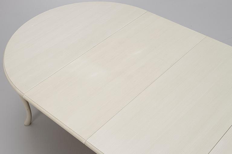 A Rococo style dining table and twelve chairs, KA Roos, Helsingborg, modern production.