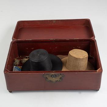 A Korean wooden wedding chest, two hats, an opium pipe, a scale, circa 1900.