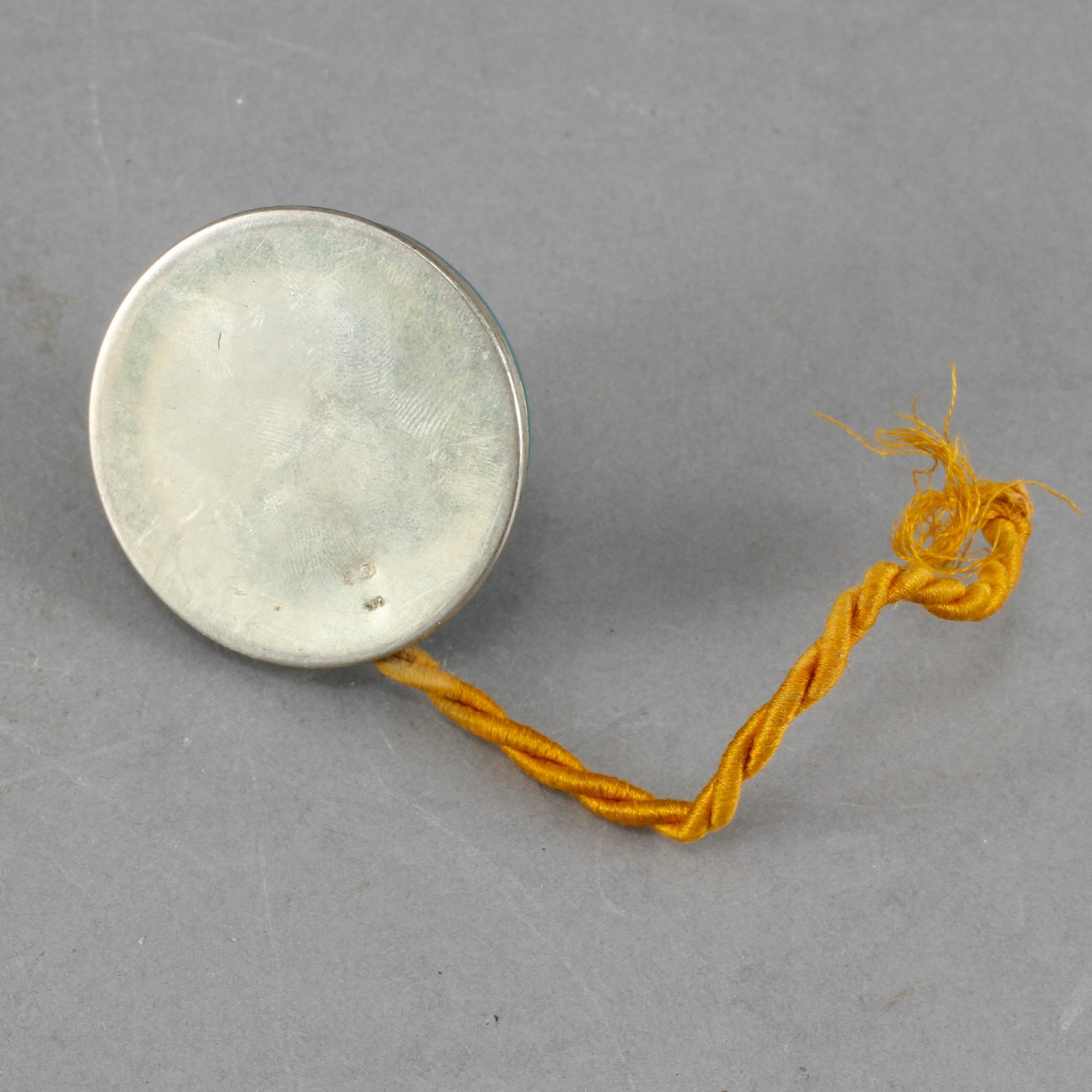 RINGKLOCKA, för elektricitet, silver och emalj, svenska importstämplar, 1900-talets första hälft.
