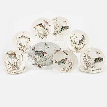 Eleven creamware plates and dish, 'Fish', Johnson Brothers, England.