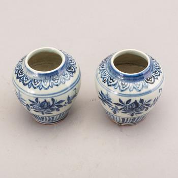A pair of Chinese porcelain miniature jars, Ming dynasty (1368-1644).